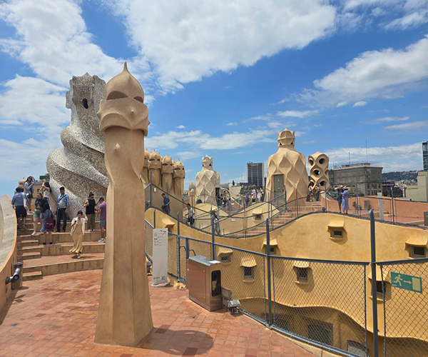 Casa Mila rooftop - surreal chimneys and panoramic view of Barcelona