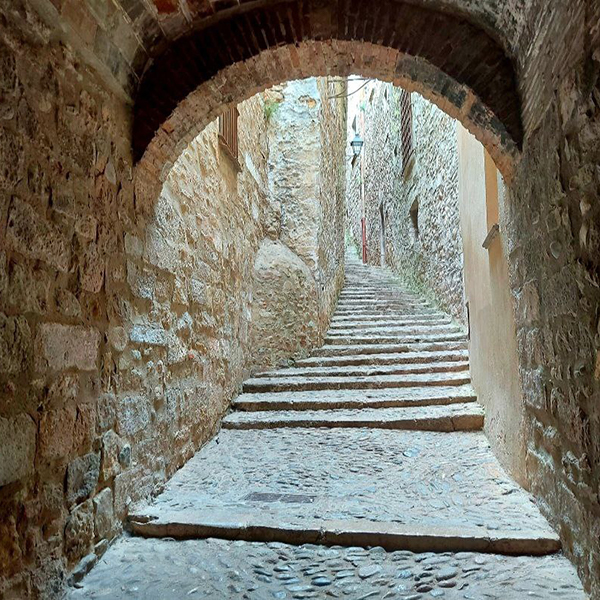 Narrow medieval street in the Jewish Quarter of Girona, one of the best-preserved in Europe