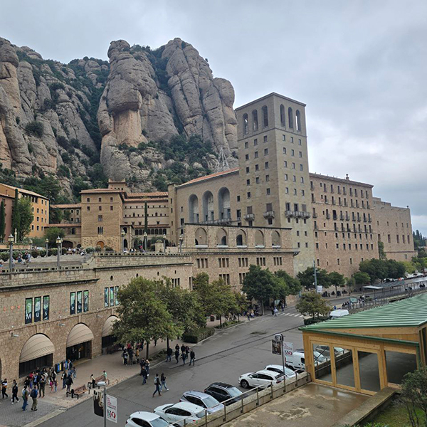 Aerial view of Montserrat Monastery, nestled among the rocky peaks
