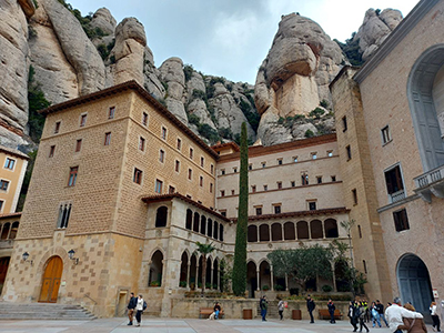 Main square of Montserrat Monastery, surrounded by historical buildings