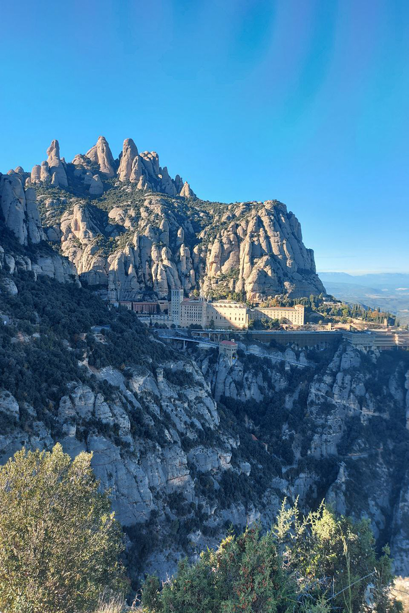 Panoramic view of Montserrat from the Cross of St. Michael, overlooking the monastery and surrounding mountains