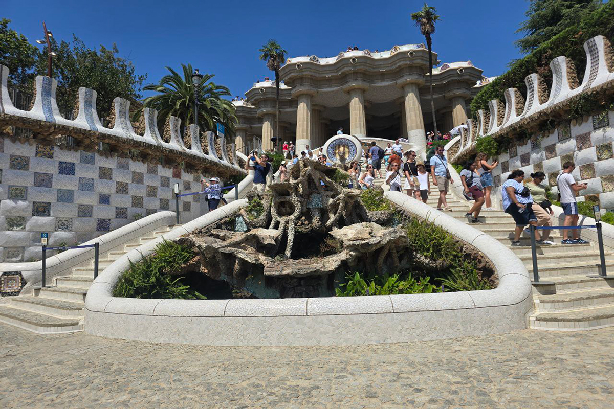 Park Guell's dragon staircase - iconic mosaic lizard by Gaudí