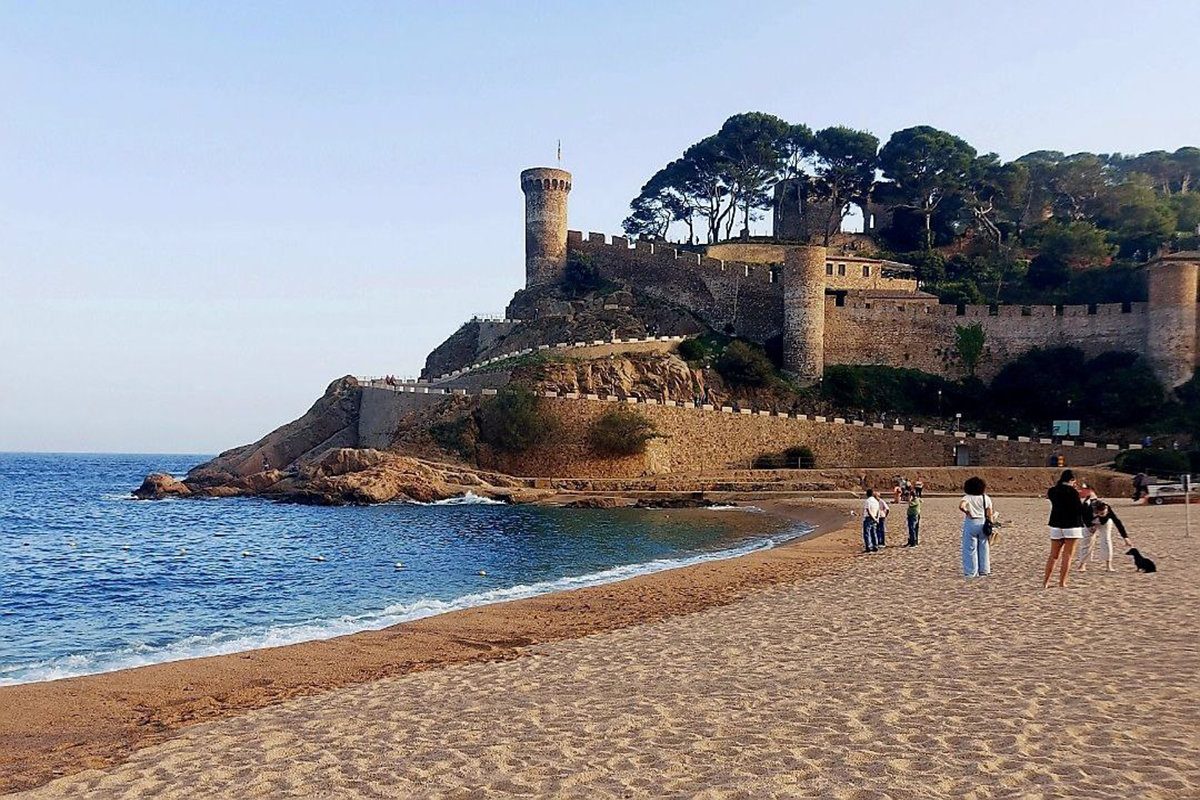 Panoramic view of Tossa de Mar with its medieval walls and coastal landscape